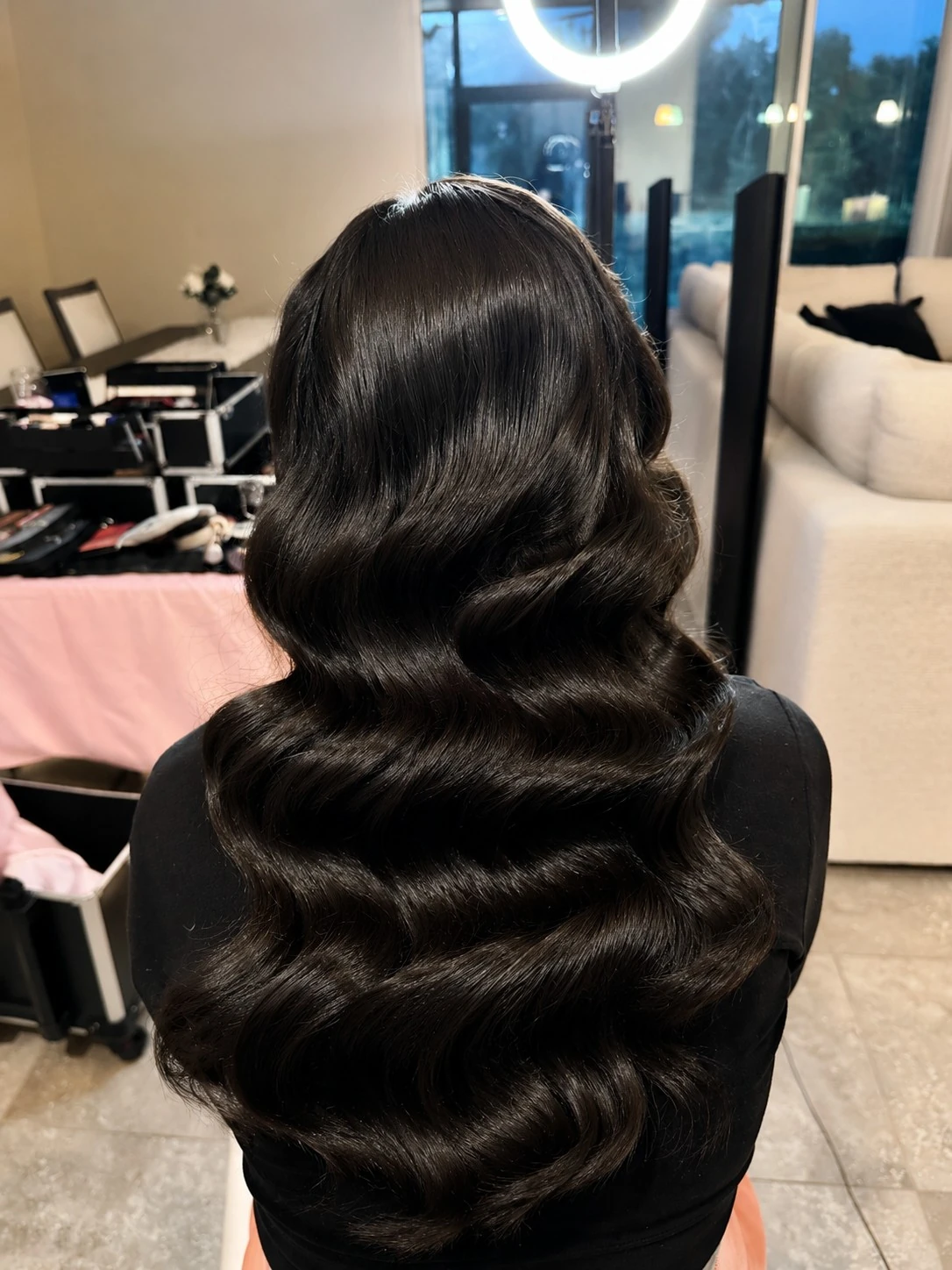 Old-Hollywood waves styled on location, back view